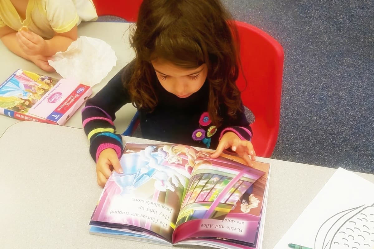 A Library & Gross Motor Area Support Their Budding Interests 2