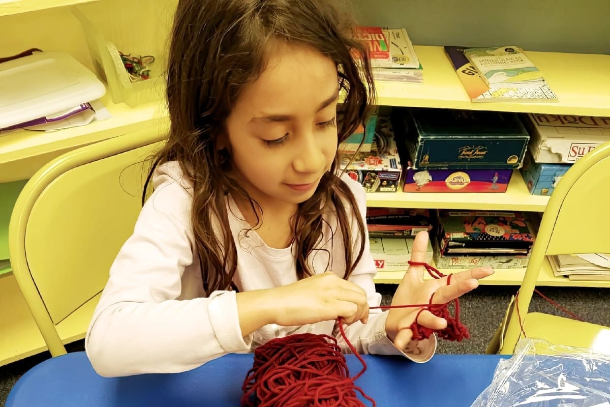 A Library & Gross Motor Area Support Their Budding Interests 4